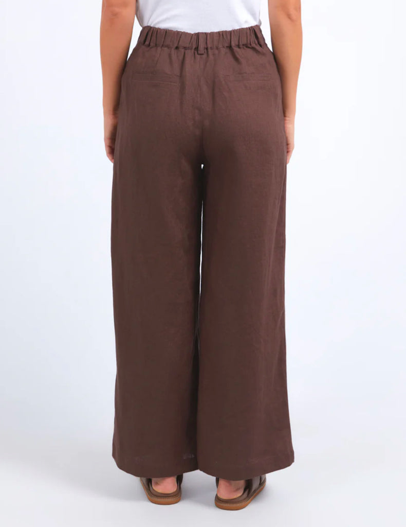 Flat front waistband with an elastic back for a comfortable fit.