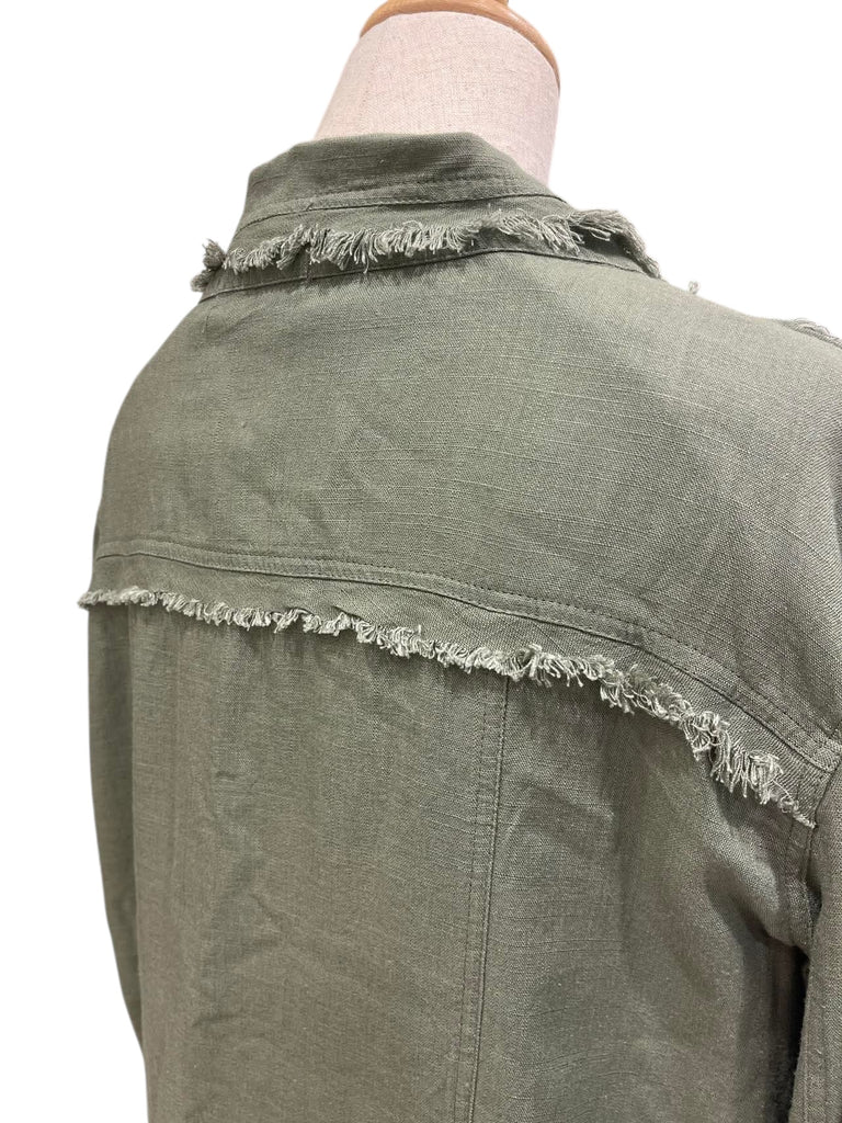 The fringe detailing on the chest pockets and shoulders adds a playful, undone finish — perfect for pairing with your favourite jeans, shorts,