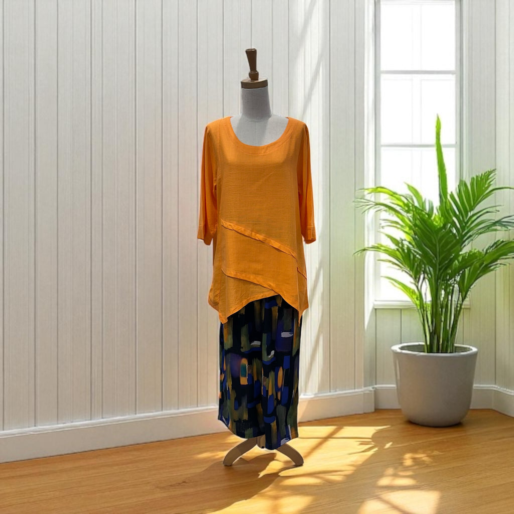 Experience comfort and style with the Emma Linen Blend Top.