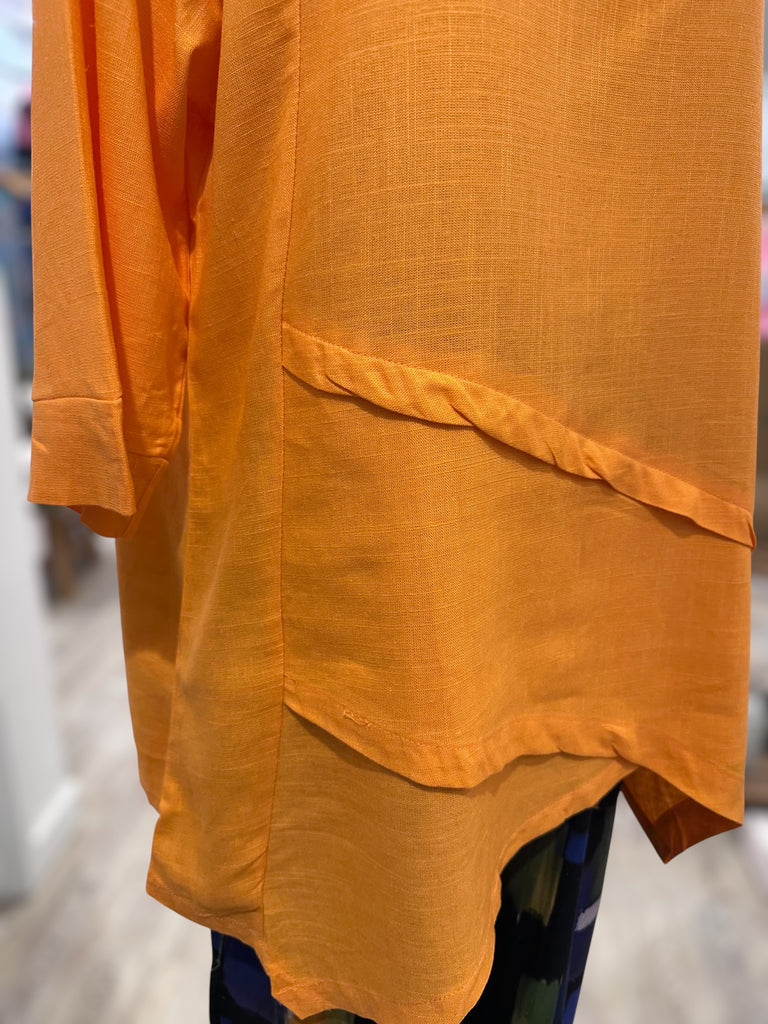  Made from a lightweight, breathable 65% linen and 35% cotton blend, 