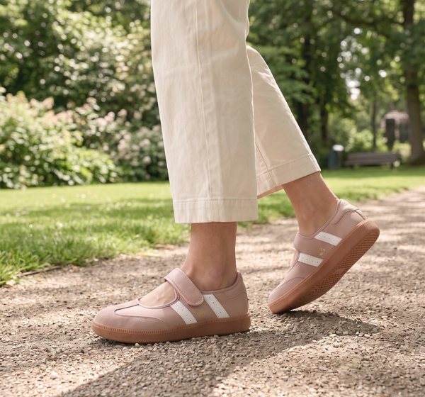 Good Soles Parlay sneakers on a garden path